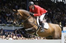 Jos Lansink of Belgium rides his horse Spender.jpg