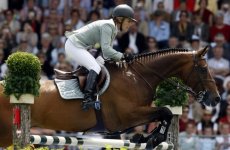 Meredith Michaels-Beerbaum rides on her horse Shutterfly 2.jpg